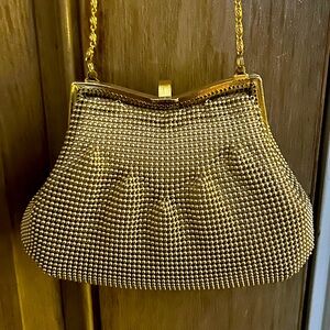 Vintage Gold beaded purse with rhinestone closure and gold trim. New w/o tags.